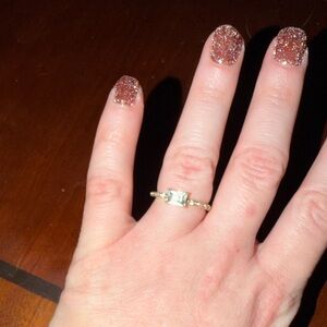 Elegant Gold Ring with Blue Stone